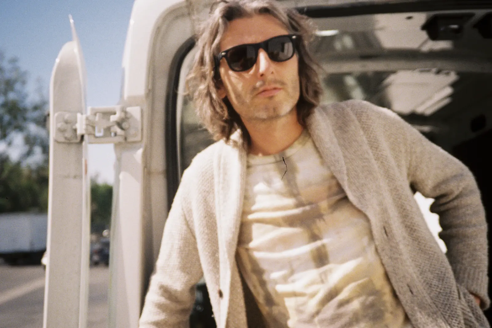 A production van loaded on location in Los Angeles, back doors open